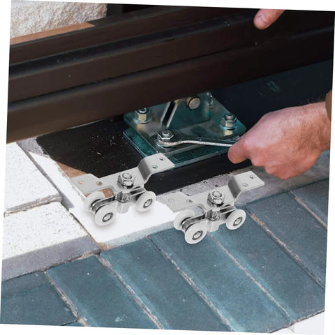 2 Pack Sliding Door Rollers Stainless Steel With Silent Nylon Wheels being installed on a track for wardrobe and barn doors