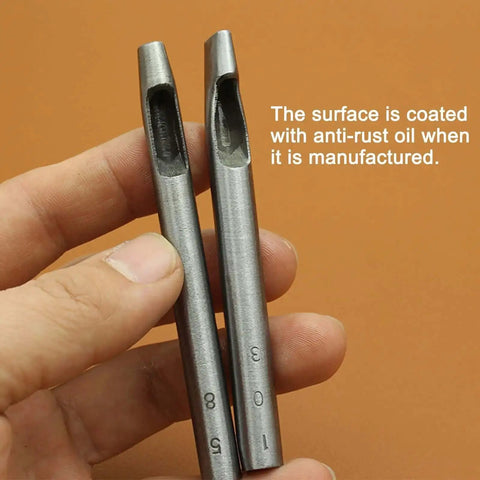 Close-up of two carbon steel punches from the 9 Size Oval Leather Hole Punch Set, showing anti-rust coating.