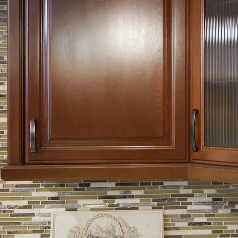 Installed Solid Zinc Alloy Kitchen Cabinet Pull Handle in Oil Rubbed Bronze on wooden cabinet doors, Simplicity Series Traditional design.