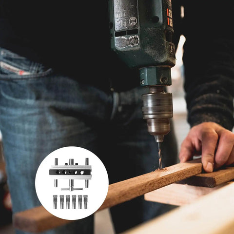 Close-up of a drill using Self Centering Dowel Drilling Locator Jig With Six Hardened Steel Bushings for precise woodwork.