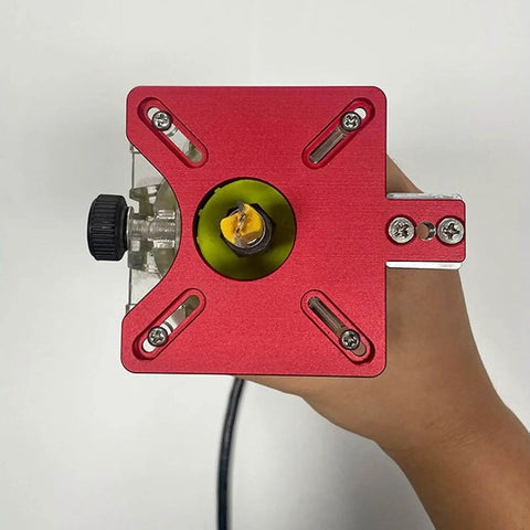 Close-up of red aluminum alloy router jig from 3 In 1 Router Milling Groove Bracket And Circle Cutting Jig For Woodworking.