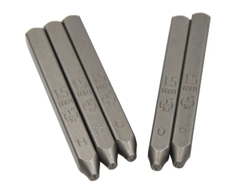 Close-up of Beefy Heavy Duty Steel Stamp Set showing uppercase letters H, R, G and numbers 0, 6 in 1.5mm size for jewelry crafting.