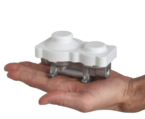 Dual Stage Propane Regulator For RVs Vans Trailers Campers 160000 BTU Vertical Mount Aluminum shown on palm side view