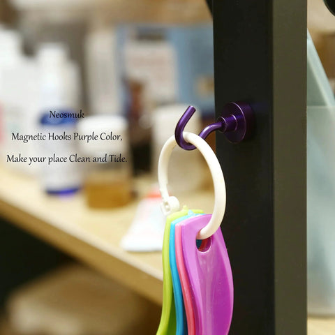Heavy Duty Magnetic Hooks 30 Pound Capacity Pack Of 10 Purple NdFeB Hangers holding plastic keychains on metal cabinet