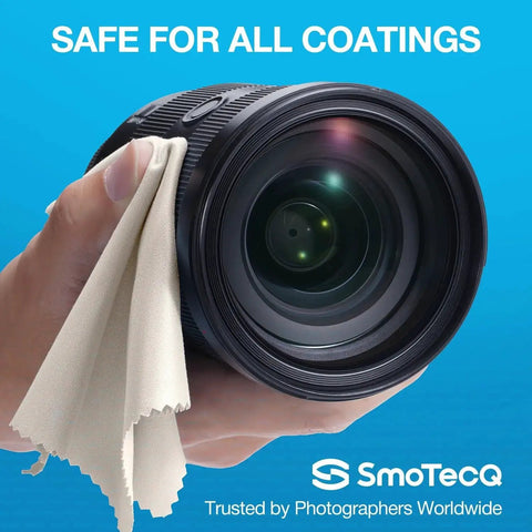 Person cleaning camera lens with microfiber cloth, highlighting "Safe for All Coatings" feature by SmoTecQ.