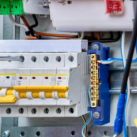 10 Pack Brass Terminal Bus Bar With Eight Position Screw Terminals installed in electrical panel, blue finish