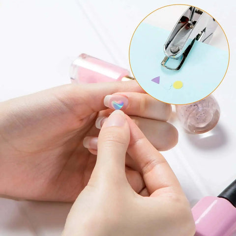 Three Piece Hole Punch Set With Round Heart And Star Shapes used on paper for DIY scrapbooking, handheld with soft grip for crafts.