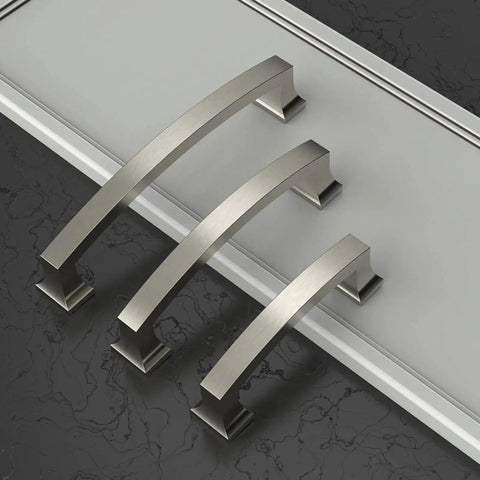 10 Pack 5 Inch Cabinet Handles Brushed Satin Nickel Center To Center 128mm Pulls lying on a counter