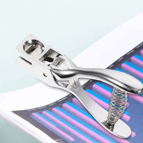 Manual Single Hole Paper Puncher for Office and School, silver oval design on document, 8 sheet capacity, portable tool for crafts and DIY