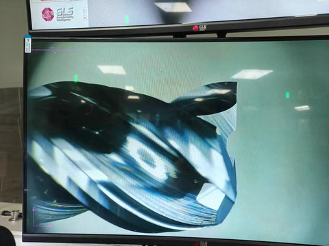 Close-up of a high finishing carbide end mill for aluminum and copper cutting with U type design square milling cutter on display screen.