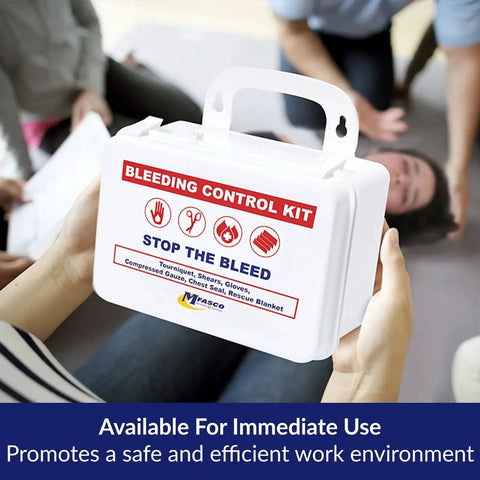 Person holding Stop the Bleed 10-Piece Bleeding Control Kit with Tourniquet and accessories in portable case.