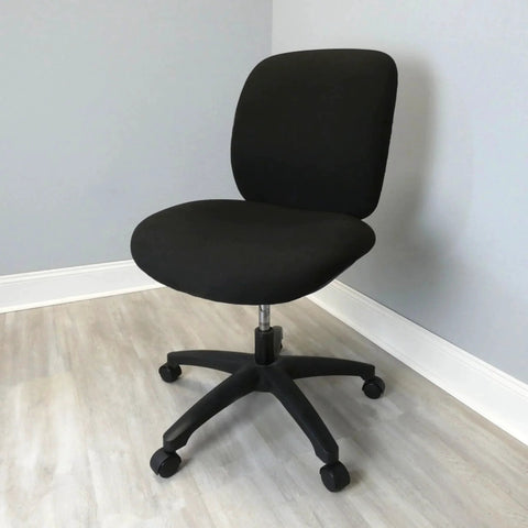 Black office chair on wheels showing 2 Inch Twin Wheel Office Chair Caster With Friction Stem Mount, Five Sixteenth Inch Stem Diameter.