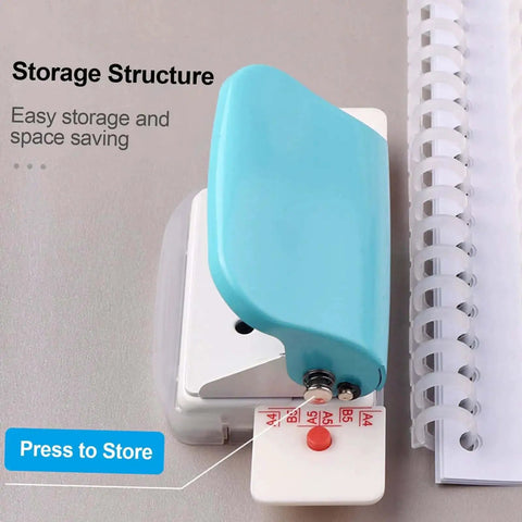 Top view of the Handy 6 Hole Puncher For A4 A5 B5 Notebooks And Scrapbooks in green, showing storage structure next to loose-leaf pages.
