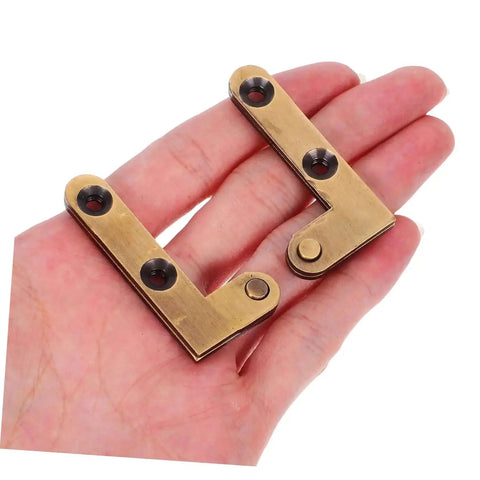 Person holding heavy duty invisible pivot hinges for wood doors slick concealed self-closing bronze finish 2 pack hardware.