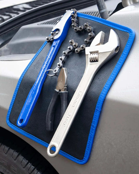 Magnetic Tool Mat Set With Four Magnetic Pads holding wrench and pliers on car hood