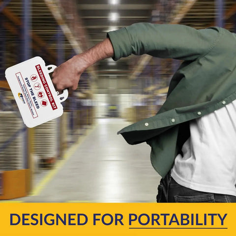 Person carrying Stop the Bleed 10-Piece Bleeding Control Kit With Tourniquet in a warehouse