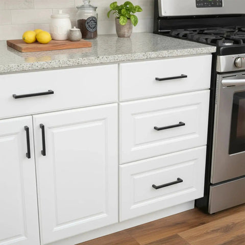 Kitchen cabinets with 10 Pack Matte Black Cabinet Handles Stainless Steel Drawer Pulls, installed on white cupboards, 7-inch hole centers.
