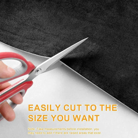 Hand cutting suede headliner fabric with scissors, demonstrating easy trimming for auto roof replacement 54x60 inches.