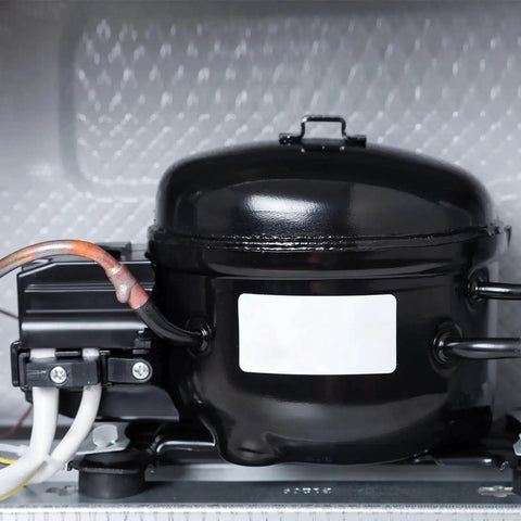 Close-up of refrigerator with PTC Starter Relay For Refrigerators One Pin Four Point Seven Ohm Overload Protector One Half Horsepower