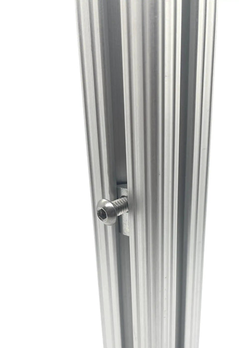 Drop-In T-Nut With Spring Ball Self Aligning 1/4-20 Tap For 15 Series Aluminum Extrusion 24 Pc Pack seen installed in profile