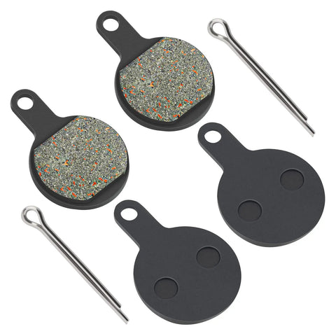 Top-view disc brake pad set for mountain bike with two friction pads, backing plates, and retaining pins.
