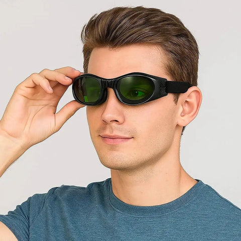 Person wearing Laser Safety Glasses for Fiber Laser Engraving and Cutting Pro Grade Eye Protection Goggles, protective eyewear on face