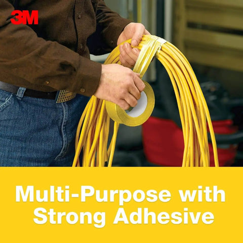 Person using Yellow Colored Duct Tape with Strong Adhesive and Water-Resistant Backing for Indoor & Outdoor Multi-Surface Use to wrap cables.
