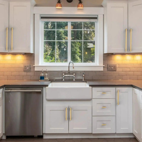 Champagne Bronze Cabinet Pulls 5 Inch Center To Center, 10 Pack Zinc Alloy Cabinet Handles installed on white kitchen cabinets.