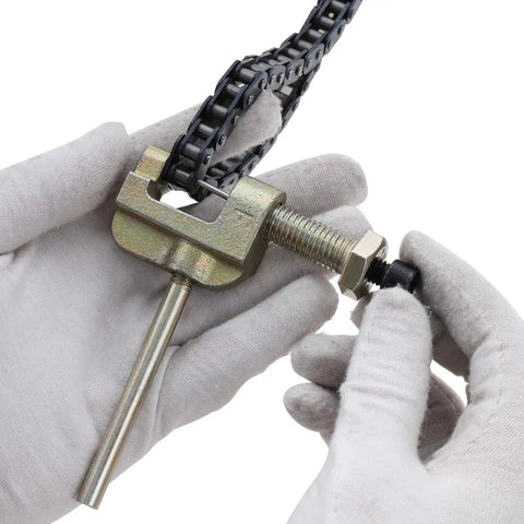 T8F Drive Chain Breaker Tool 116 Link Heavy Duty For 43cc 47cc 49cc 50cc 2 Stroke Pocket Rocket Bikes demonstrated removing chain link.