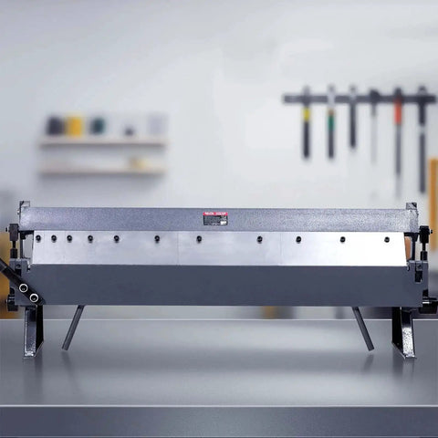Front view of Box And Pan Brake 36 Inch Sheet Metal Bending Tool With 16 Gauge Mild Steel Capacity and six fingers in workshop