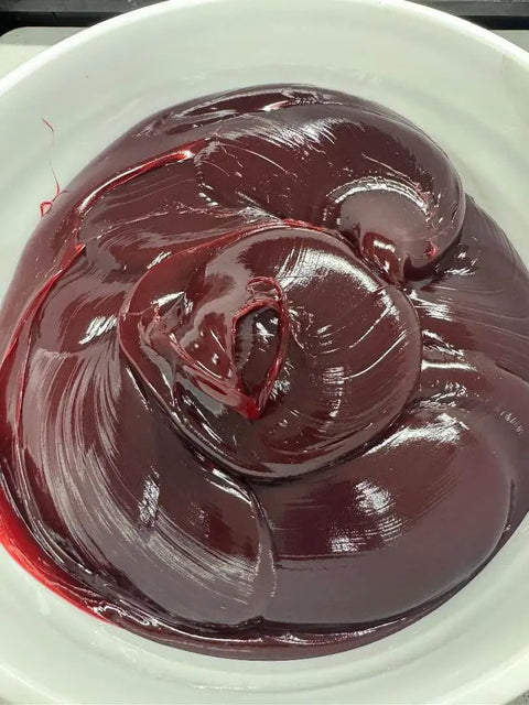Close-up view of Red High Temp Grade Two Lithium Complex Multi Purpose Grease in a 35 pound pail for wheel bearings and chassis.