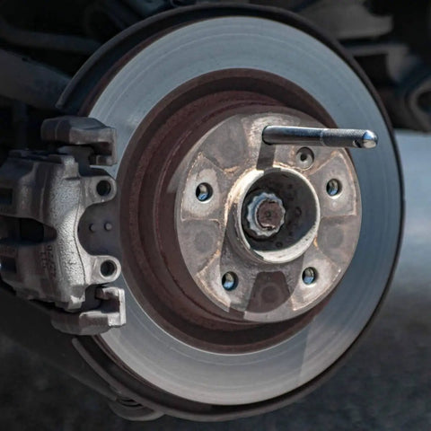 Wheel Lug Bolt Alignment Pin Guide Tool With Knurled End M14x1.25 Metric Threads installed on car hub