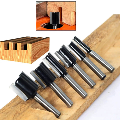 Pro Grade Six Piece Straight Router Bit Set With One Quarter Inch Shank Carbide Tipped Two Flute Bits For Woodworking Grooving Rabbet Cuts And Jointing In Diameters From One Quarter To Three Quarters Inch For A Smooth Planed Finish displayed on wooden board