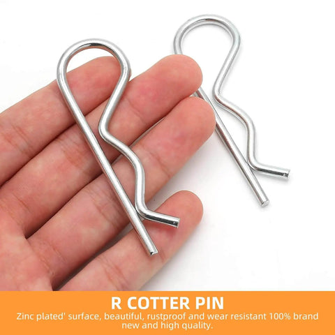 Close-up of hand holding Heavy Duty Hitch Pins R Clips and Spring Retaining Wire Hair Pins for Trailers Tractors Mowers Carts and Trucks 3.5mm Wire Diameter 90mm Length Pack of 10 4.8 Carbon Steel with Galvanized Finish, showing zinc-plated finish