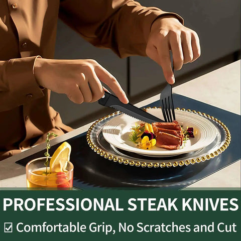 Person using black flatware set for 4 with steak knives from 24 piece stainless steel cutlery on elegant dinner plate