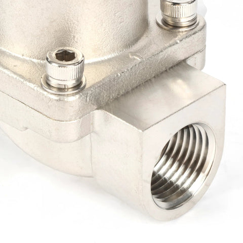 Side close-up of a stainless steel 1/2 in solenoid valve body with a threaded port.