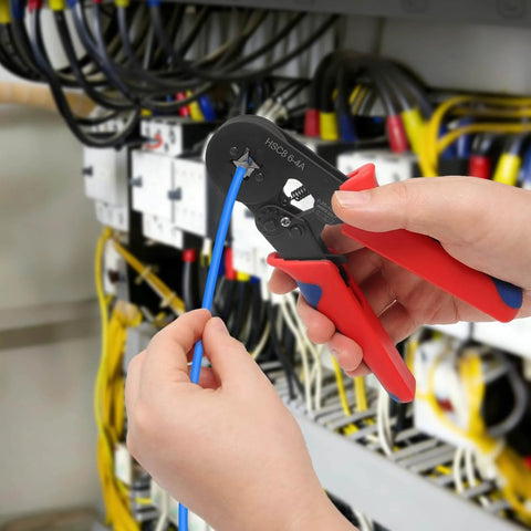All In One Crimping Tool Kit With 1800 Ferrules, Self Adjusting Ratchet Crimper, Eight Ferrule Sizes From AWG 22 To 7 (0.5-10mm2) being used on electrical wires in a panel.