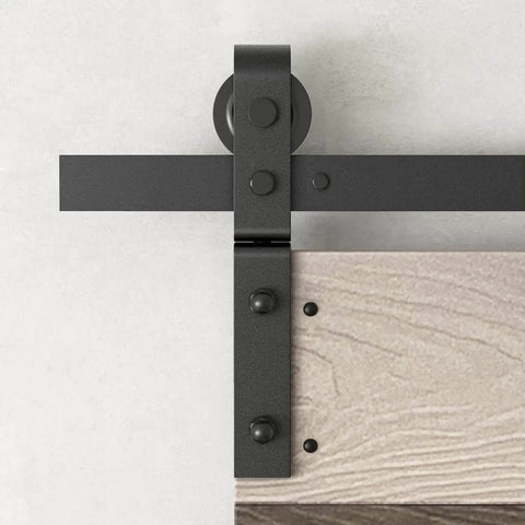 Close-up of embossed bi fold barn door with sliding hardware kit in dark walnut aged barrel finish, 3D texture pine wood surface.