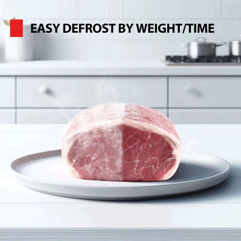 Frozen meat on a plate showing easy defrost by weight/time feature of the Compact Space Saver 0.9 Cu Ft Microwave Oven