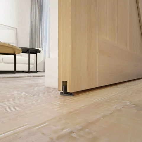 Close-up view of Six Foot Sliding Barn Door Hardware Track Kit Aluminum Box Rail Wall Mount Interior Wooden Doors floor guide installed
