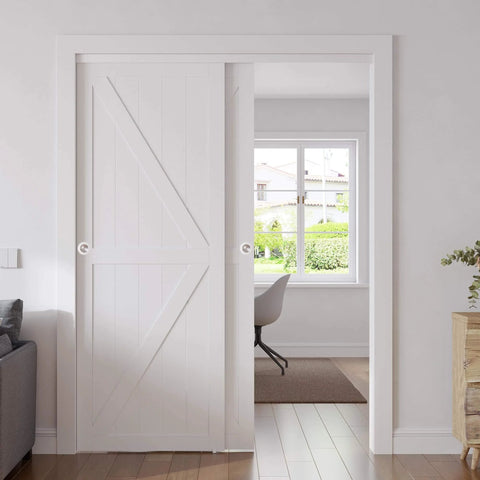 Double Barn Style Sliding Closet Doors 48x80 Inches With Hardware Kit in white finish installed in a living area.