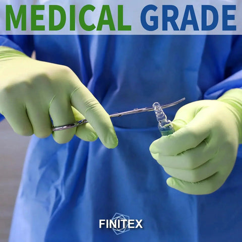 Person wearing nitrile disposable gloves powder free latex free 3.5Mil food green small 100pcs using scissors for medical task.