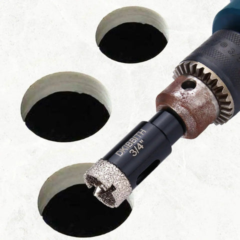 Close-up view of Three Quarters Inch Diamond Hole Saw Set With Pilot Bit Two Pack Diamond Tipped Tile Saws installed in drill on tile.