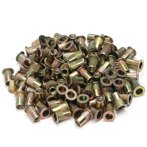 Pile of 100 Pcs 1/4-20 Carbon Steel Rivet Nuts Kit SAE Threaded Inserts for creating threaded holes in metal.