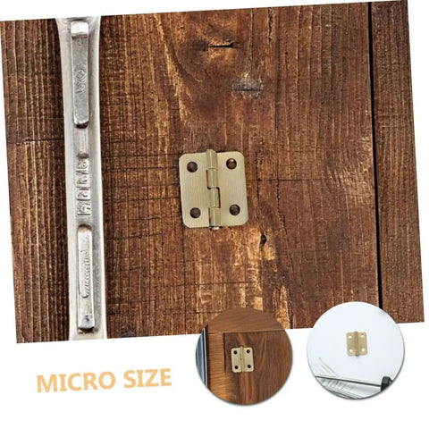 40 Piece Iron Miniature Hinges With Screws For Jewelry Box And Wooden Chest on wooden surface, showing hinge detail and size comparison.