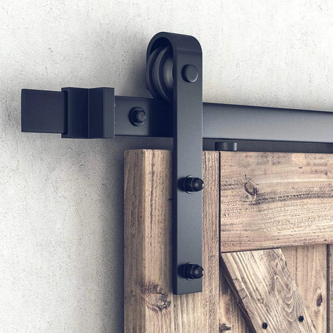 Close-up of installed 8 Ft Double Barn Door Hardware Kit For 24 Inch Wide Doors Ultra Smooth Quiet Sliding Track With J Shape Hanger