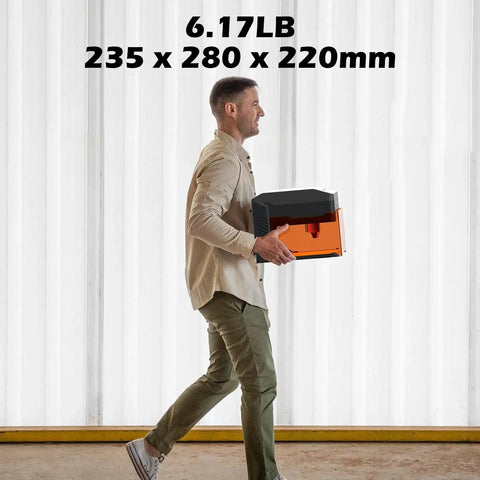 Person carrying Portable 10W Laser Engraver For Home Use With Acrylic Enclosure And Lightweight Engraving Area, 235x280x220mm