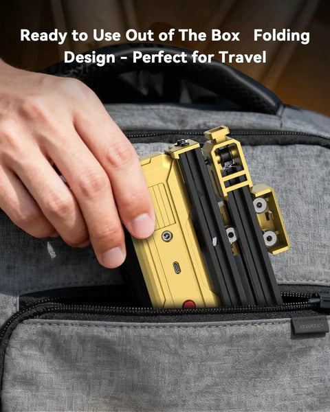 Person placing Foldable 7W Laser Engraver With 0.01mm Precision, Portable DIY Laser Cutter into backpack pocket