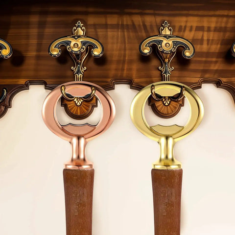Close-up view of 12 Piece Stainless Steel Bottle Opener Inserts Kit with threaded flat openers in antique colors on wood.