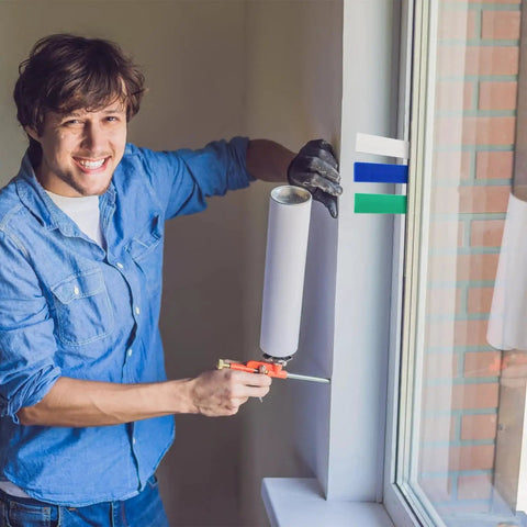 Man using Bulk 300 Piece Plastic Flat Shim Set for Leveling and Tile Installation Color Coded by Thickness next to a window